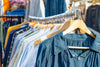 A rack of stylish second-hand clothes